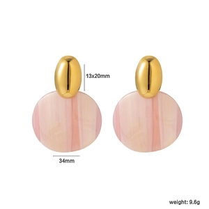 Oval gold metal earrings with large pink resin disc and dimensions showing 34mm size