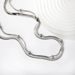 Double-layered silver stainless steel necklace with herringbone and beaded chains