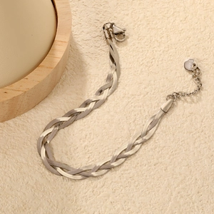 Braided stainless steel herringbone chain bracelet in silver with a lobster clasp closure