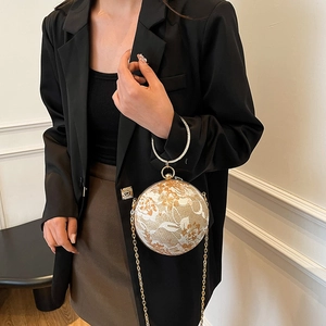 Elegant spherical lace clutch bag with gold ring handle and metal chain shoulder strap