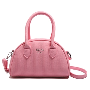 Pink striped shell-shaped handbag with top handles and adjustable shoulder strap