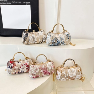 Vintage embroidered evening box bag with floral patterns and gold chain strap