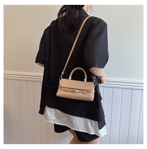 Fashionable khaki square crossbody bag with glossy leather and adjustable shoulder strap