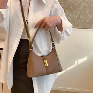 Brown diagonal embossed hobo bag with gold buckle and dual straps for women