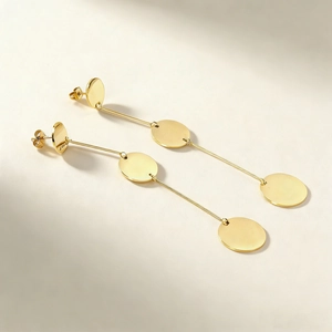 Elegant gold stainless steel geometric drop earrings with three polished round disks