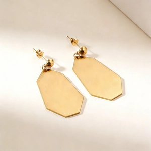 Boucles d'oreilles géométriques en acier inoxydable doré avec texture en métal brossé