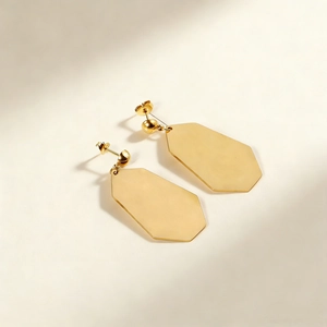 Boucles d'oreilles minimalistes en acier doré avec sphère et pendentif hexagonal