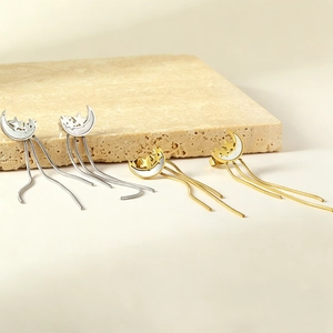Long stainless steel chain tassel earrings with shell moon and star design in gold and silver