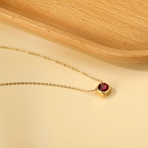 Elegant 18K gold plated necklace with a square pendant and a round red gemstone center