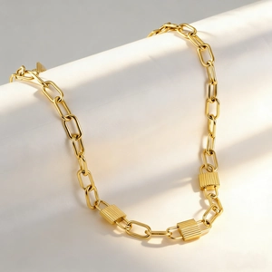 Chunky chain link necklace with triple textured lock pendants in 18K gold plated finish
