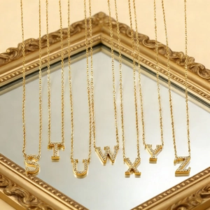 18K gold plated stainless steel letter necklace with crystals in a vintage gold mirror