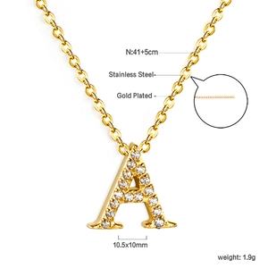 Macro shot of 18K gold plated stainless steel A-letter pendant with pavé set cubic zirconia