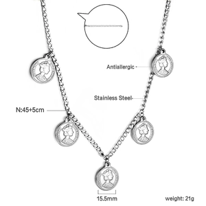 Macro shot showing five circular portrait coin pendants on a gold stainless steel chain