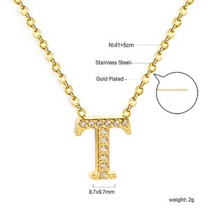 Detail view of 18K gold plated letter T pendant with zircon inlays and dimensions