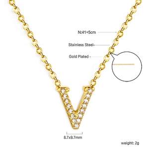 Detail view of 18K gold plated V letter pendant necklace with sparkling zircon pavé