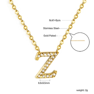 Detail of 18K gold plated stainless steel Z initial pendant with zircon inlays