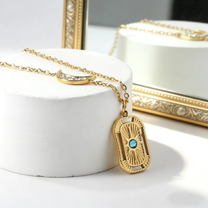 18K gold plated stainless steel necklace with moon and blue crystal sun pendant charms