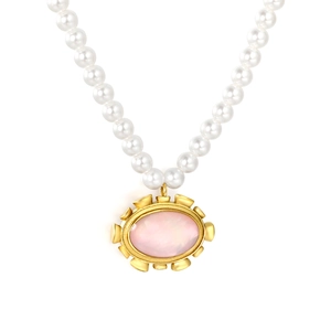 French retro pearl necklace with a pink shell pendant in a vintage gold frame