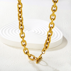 Golden chunky stainless steel oval link necklace featuring a classic OT toggle clasp