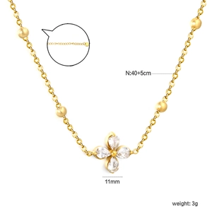Elegant gold bow chain necklace with a four-petal zircon flower pendant for women