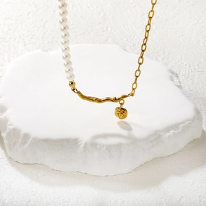 French luxury necklace with white pearls, gold branch design and rose pendant charm