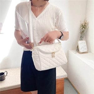 White quilted PU leather handbag with gold zipper and adjustable shoulder strap for women