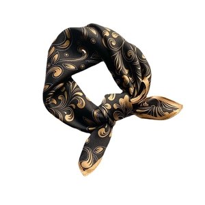 Elegant silk square scarf featuring baroque gold floral patterns on a black background