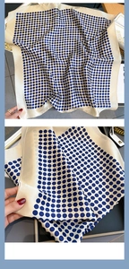 Close-up of silk polka dot scarf featuring navy dots on beige with premium satin luster