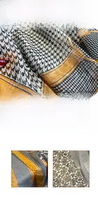 Detail of houndstooth silk scarf showing digital printing and fine edge sealing