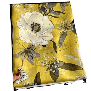 Floral print lightweight summer scarf and beach shawl in bright yellow and white