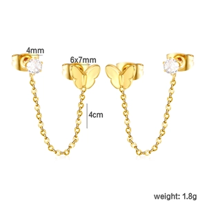 Detailed view of butterfly and zircon stud earrings with 4cm gold chain for double piercings