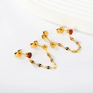 Fashionable gold butterfly double piercing chain earrings with red zircon accents