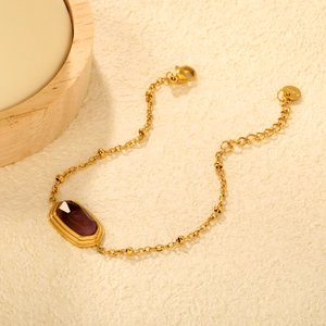 Vintage gold plated stainless steel bracelet with purple gemstone and small beads