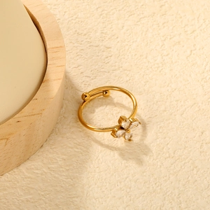 Adjustable gold flower ring featuring sparkling white zircon petals and polished finish
