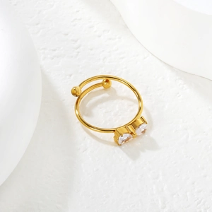 Elegant 18k gold geometric open ring featuring double heart-shaped cubic zirconia stones