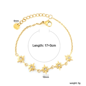 Detailed view of gold bow bracelet with star charms, zircon stones, and size dimensions