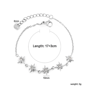 Detail of silver stainless steel star bracelet with zircon stones and dimension marks