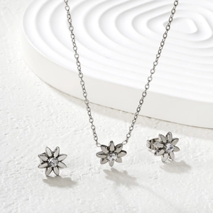 Silver flower necklace and earrings jewelry set with sparkling center zircons