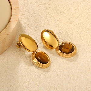 Fashionable gold oval drop earrings with geometric tiger eye stone and polished metal