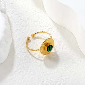 Vintage style gold open ring with round green malachite stone and twisted band design