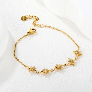 Gold-plated stainless steel star bracelet with Czech crystals for women on a white background