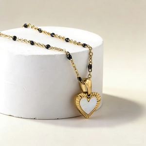 18K gold plated necklace featuring heart pendant with shell inlay and black beads