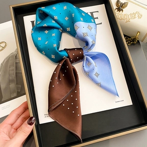 Elegant silk scarf with tricolor block design and polka dots in a golden frame