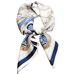 Elegant silk square scarf with nautical anchor and sailboat patterns in navy and gold