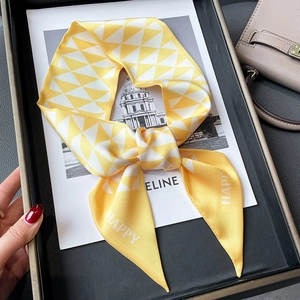 Geometric yellow and white patterned skinny silk scarf with Happy letter print
