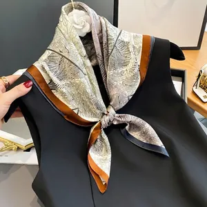 Elegant mulberry silk scarf with vintage palm leaf print in brown and beige tones