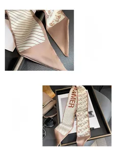 Detail of silk scarf with vintage horse print and refined inner seam craftsmanship