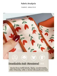 Détail du tissu en sergé à motif floral montrant des tulipes rouges et soie douce