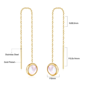 Detail of gold-plated stainless steel threader earrings with shell-inlay round pendants