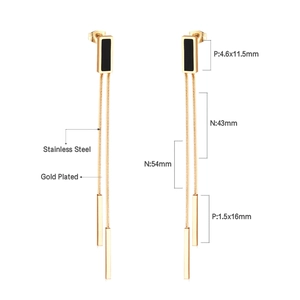 Detailed view of gold plated long tassel earrings with black shell and size markings